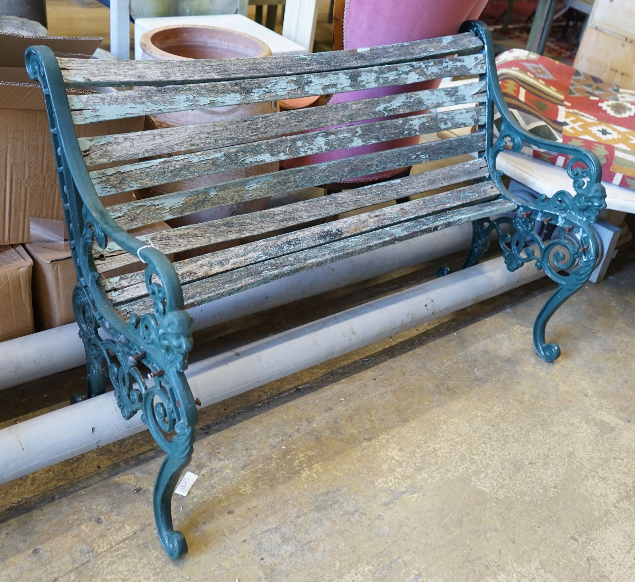 A painted aluminium slatted garden bench, in need of restoration, width 125cm
